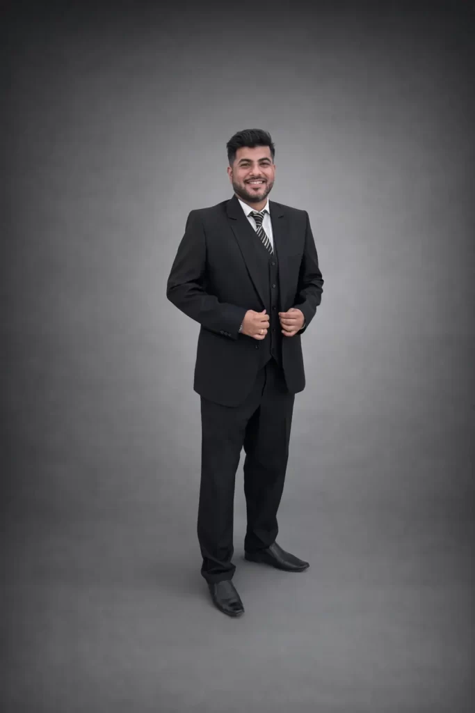 Thobani Saif Shabbir photo of him posing in suit